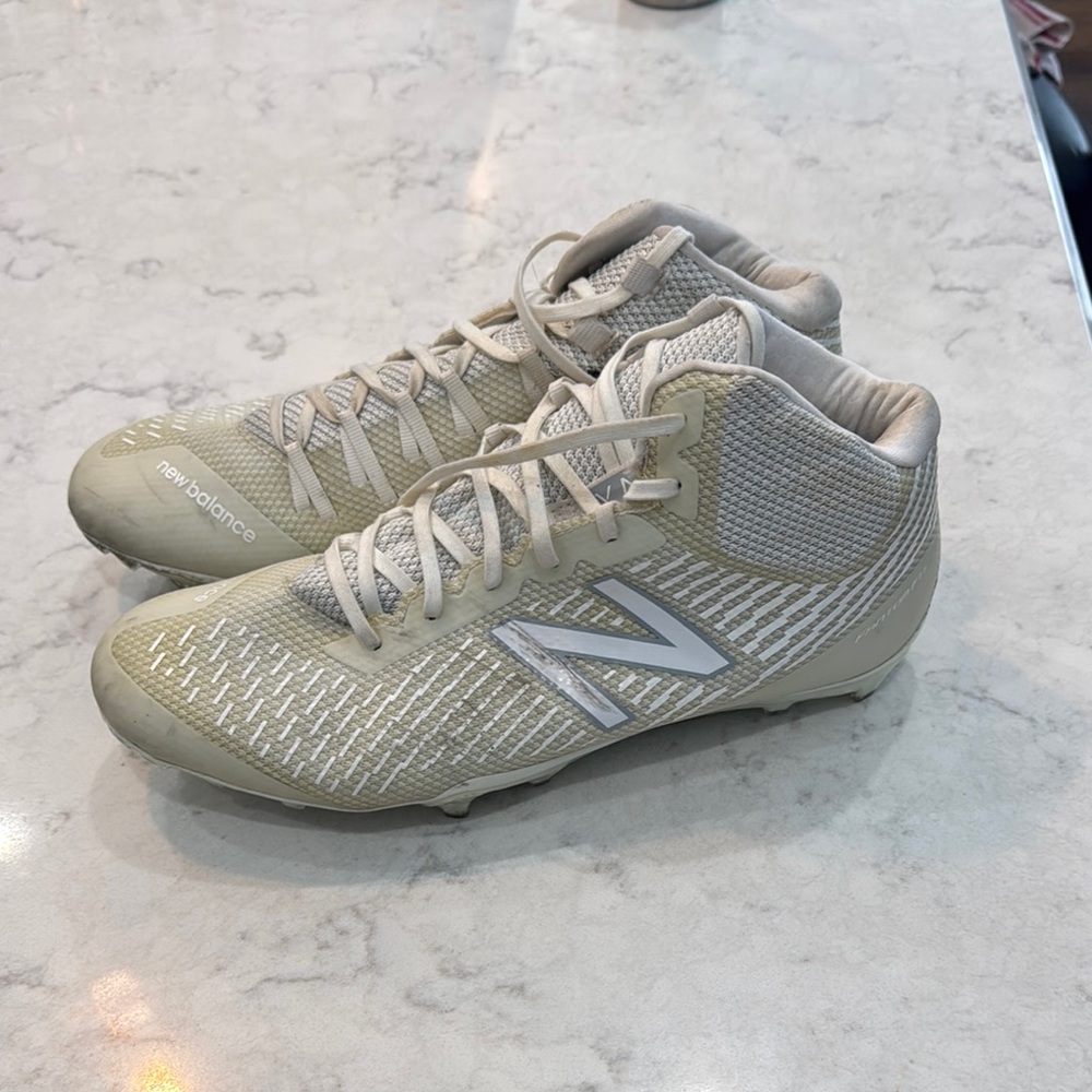 New Balance white Cleats